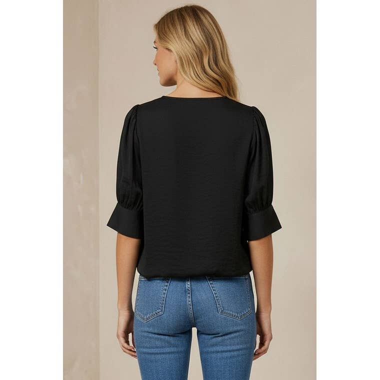 Naked Zebra high-low bubble-hem blouse on model