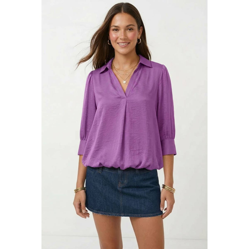 Naked Zebra high-low bubble-hem blouse on model