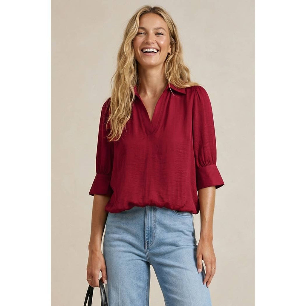 Naked Zebra high-low bubble-hem blouse on model