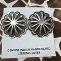 Handcrafted sterling silver concho earrings with scalloped floral design on a Genuine Indian Handcrafted Sterling Silver card