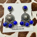 Lapis lazuli and sterling silver concho dangle earrings with sunburst stampwork design on a Genuine Indian Handcrafted Sterling Silver card