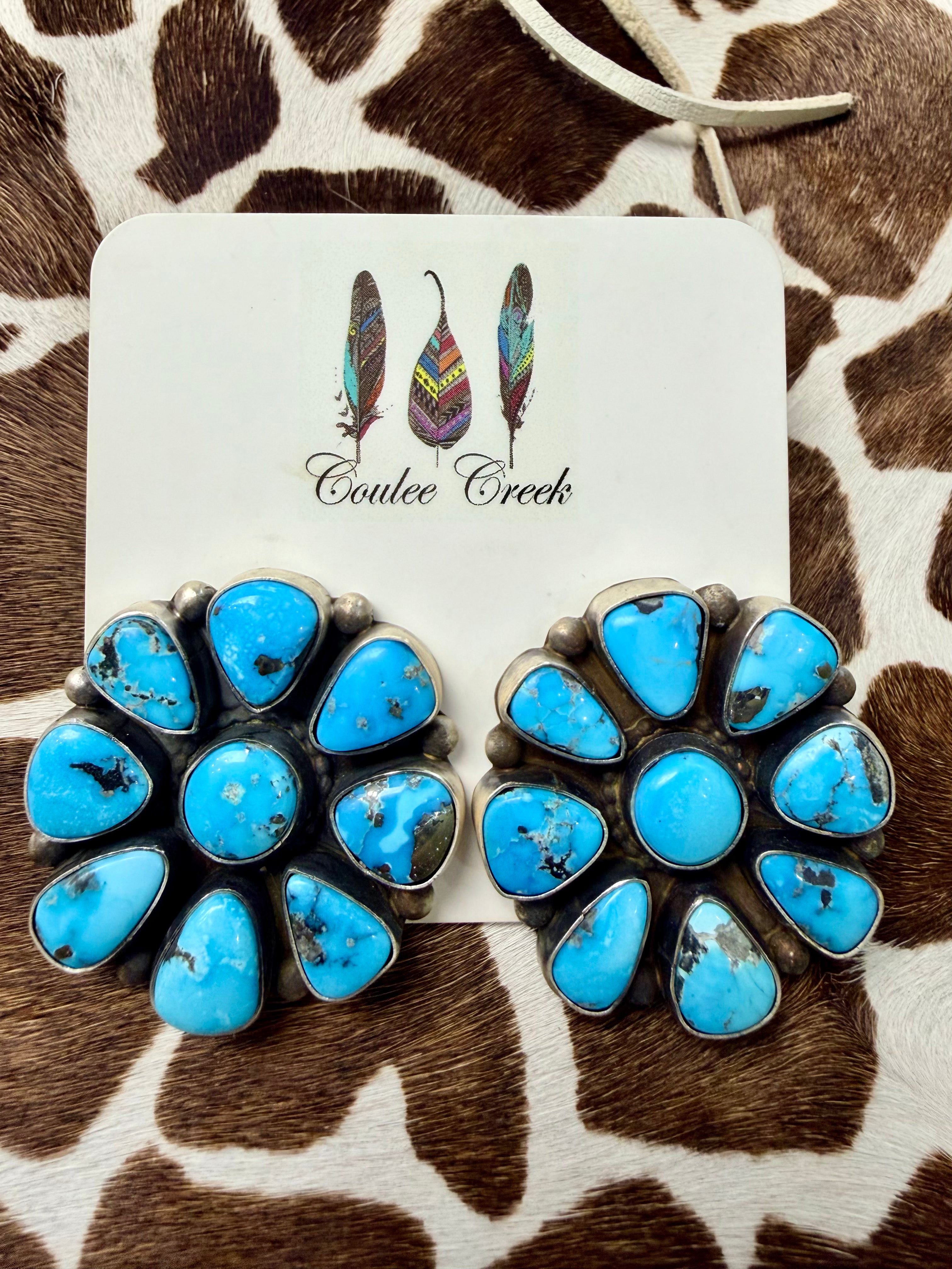 Large turquoise cluster stud earrings with sterling silver settings on a Coulee Creek branded card