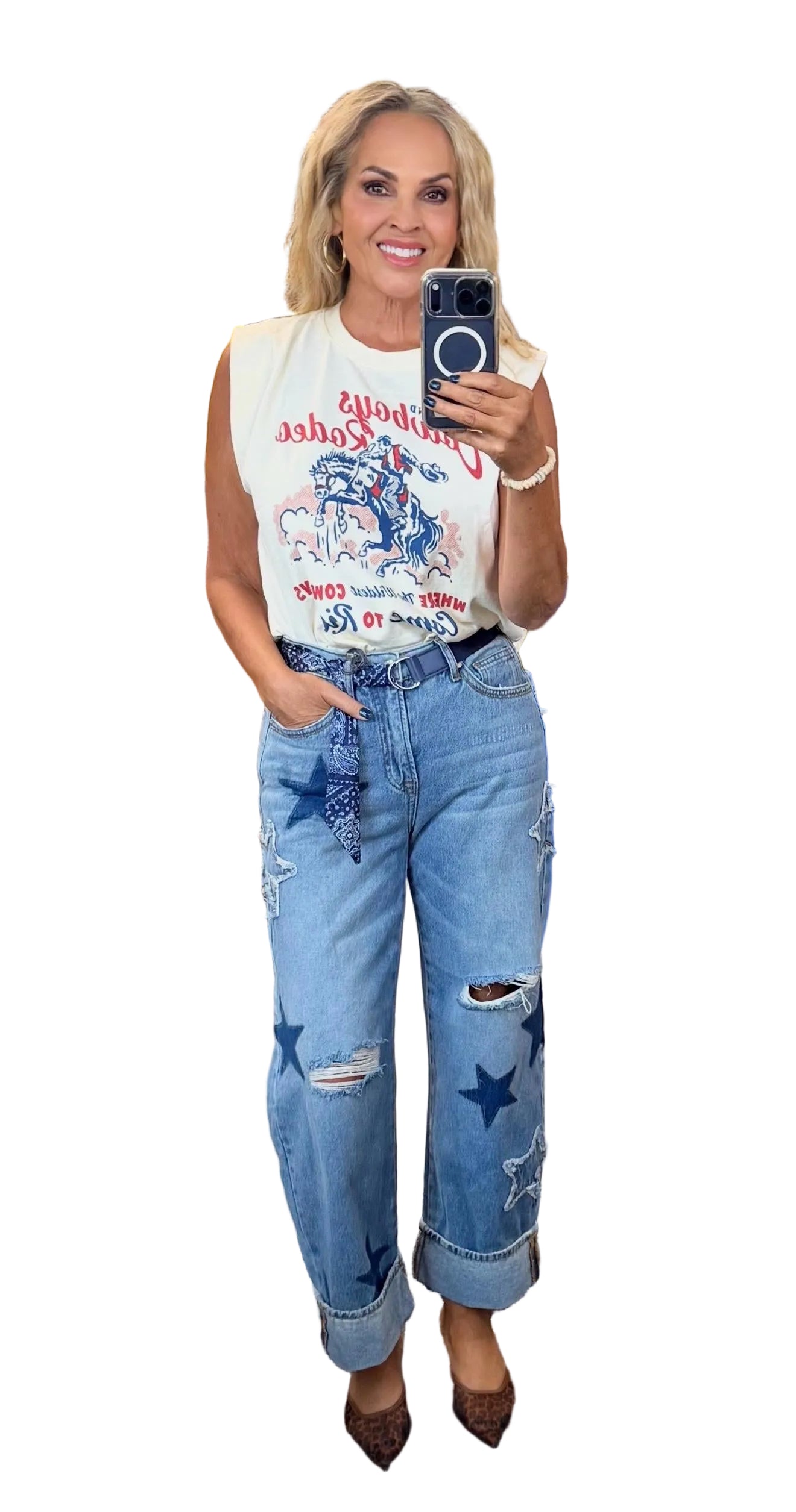 Saige light-wash high-rise cuffed star barrel jeans on model