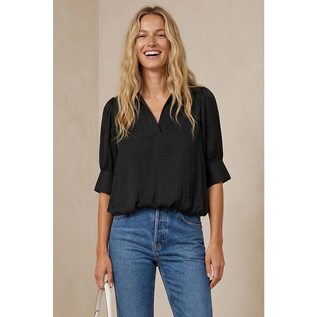 Naked Zebra high-low bubble-hem blouse on model