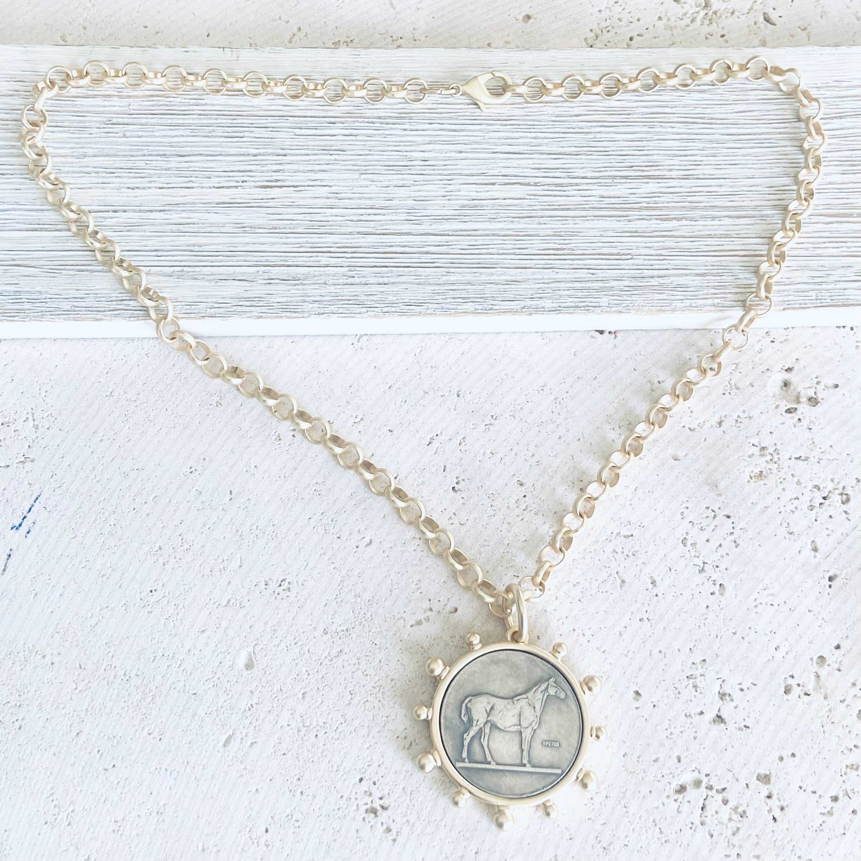 Matte gold horse coin jewelry 