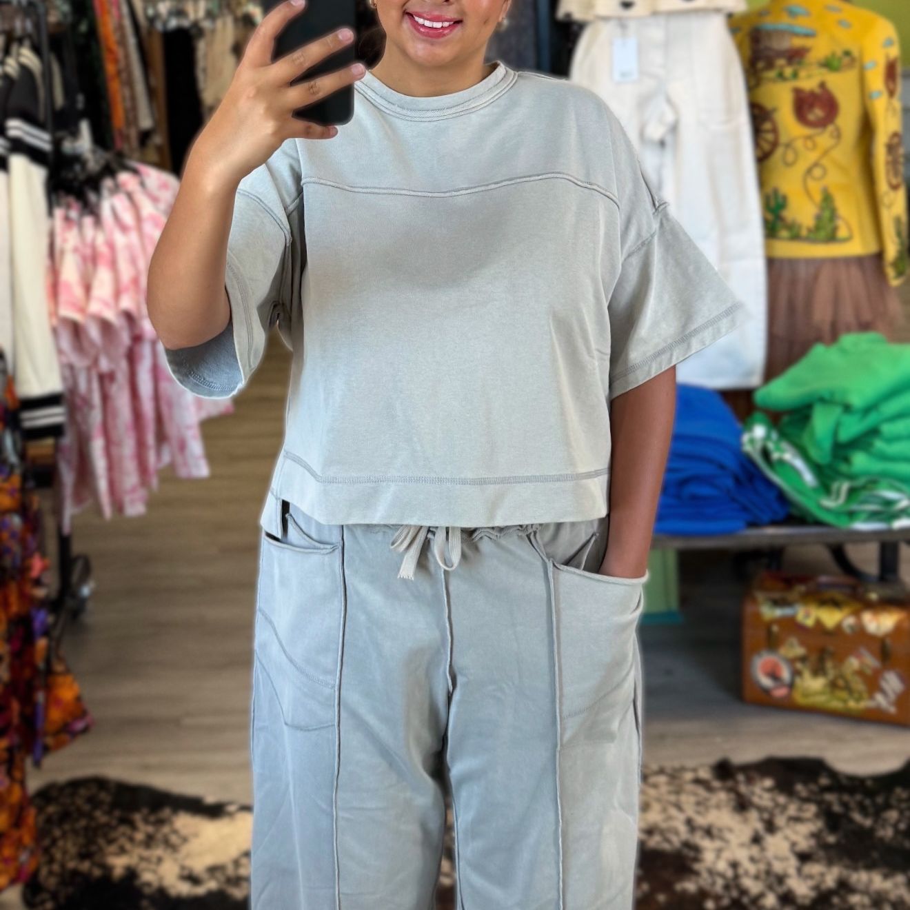 Mineral washed exposed-seam crop tee and barrel pants set in dove grey, full-length on model